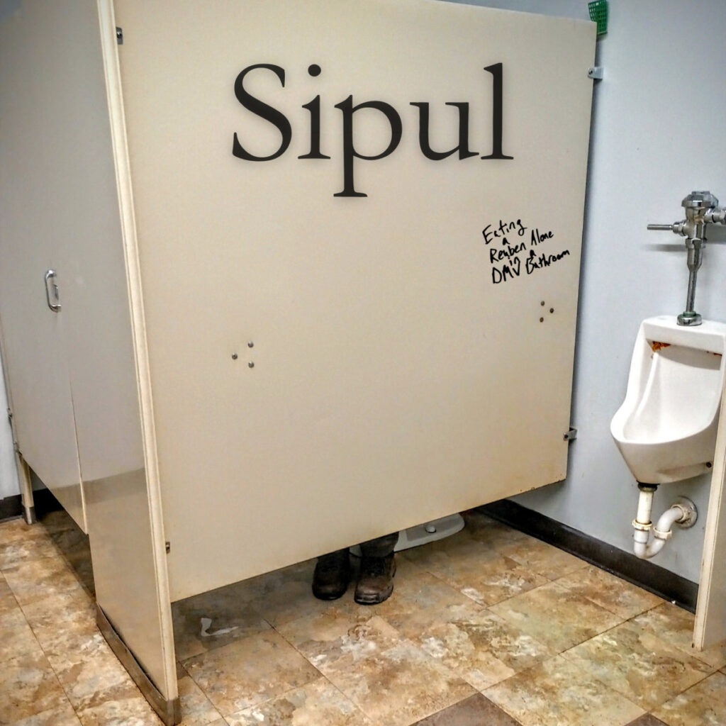 Cover Single Art Sipul Eating a Reuben Alone in a DMV Bathroom